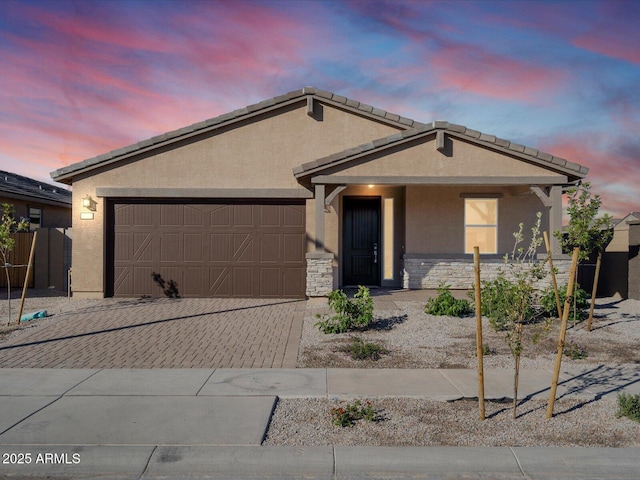 view of front of property featuring a garage