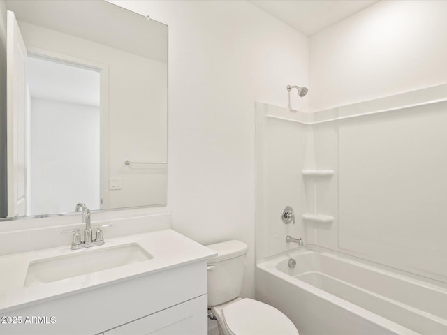 full bathroom with toilet, vanity, and washtub / shower combination