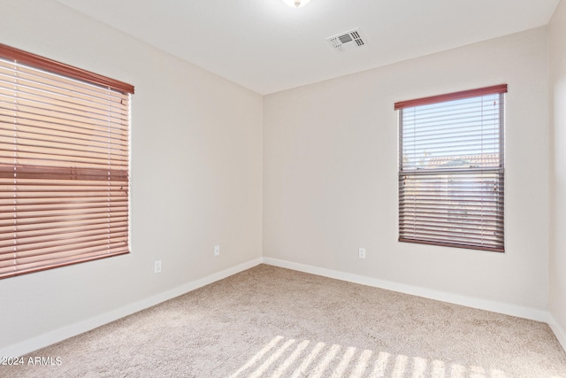 view of carpeted spare room