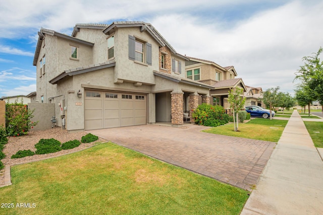 3938 E Appaloosa Rd, Gilbert, AZ 85296 - view of front of house with an attached garage, decorative driveway, stucco siding, and stone siding