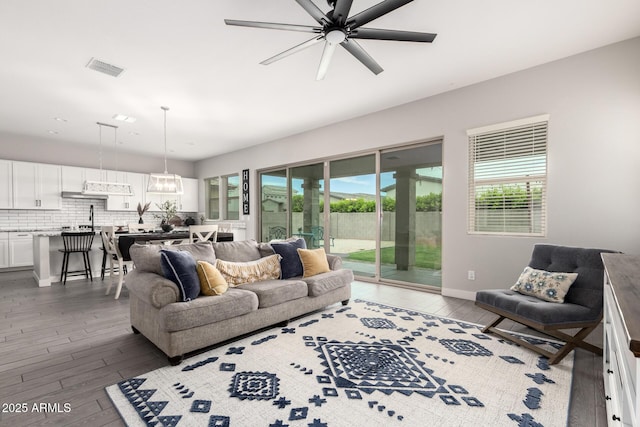 3938 E Appaloosa Rd, Gilbert, AZ 85296 - living room with wood-type flooring and ceiling fan