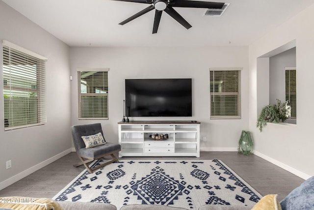 3938 E Appaloosa Rd, Gilbert, AZ 85296 - living area with a ceiling fan, wood finished floors, and baseboards