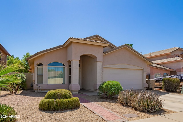 view of front of property featuring a garage