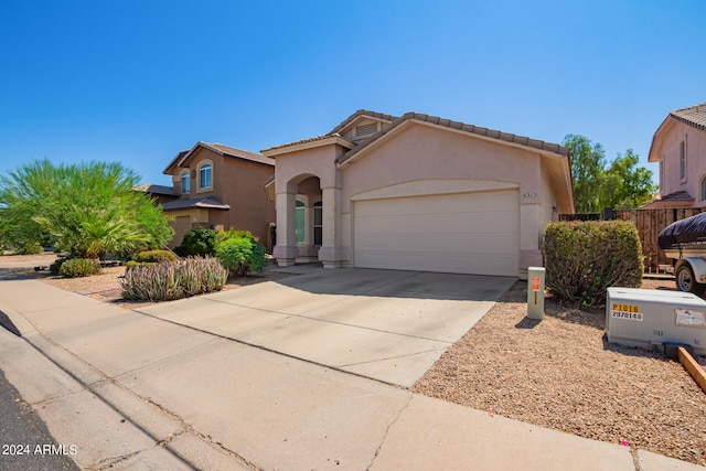 view of front of house with a garage