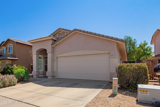 view of front of home with a garage