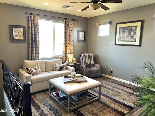 living area featuring recessed lighting, wood finished floors, a ceiling fan, visible vents, and baseboards