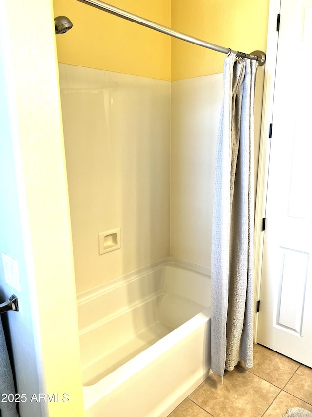 full bath featuring shower / tub combo and tile patterned floors