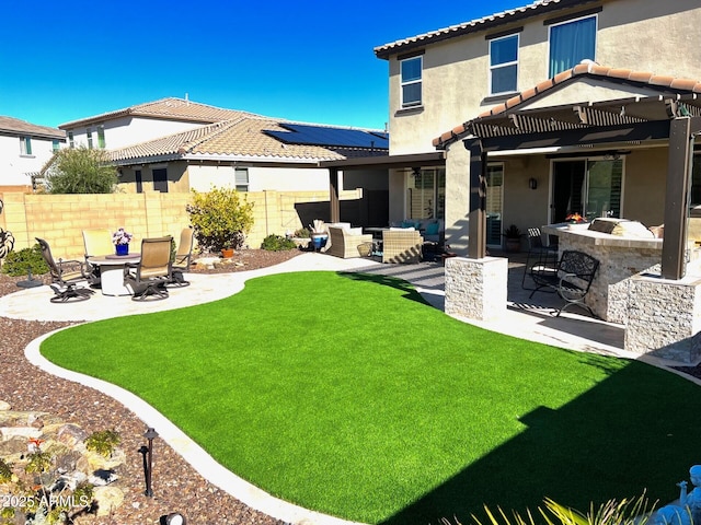 back of house featuring a patio, a tile roof, fence, an outdoor living space, and a pergola