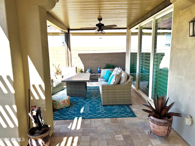 view of patio with an outdoor hangout area and ceiling fan