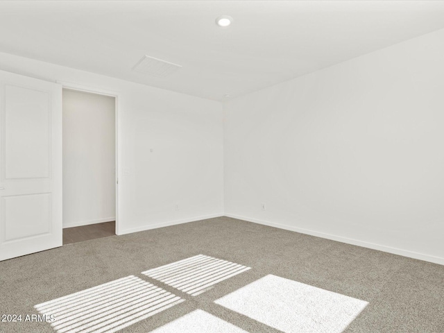 empty room with carpet flooring