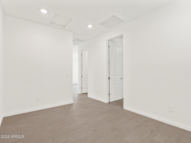 spare room with light wood-type flooring