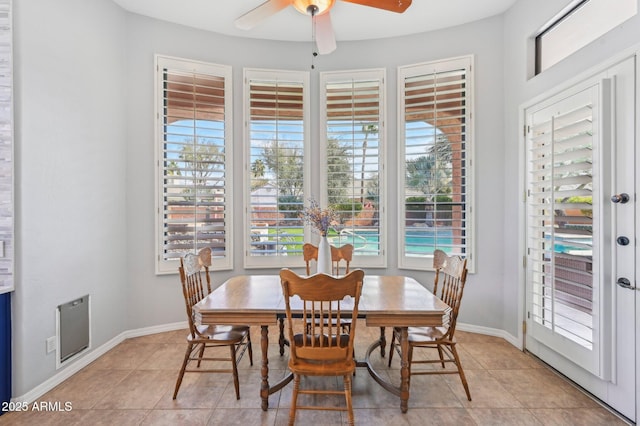 dining room featuring ceiling fan and light tile patterned floors