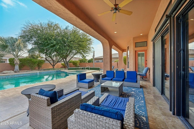 view of patio / terrace featuring an outdoor living space, ceiling fan, and a pool with hot tub