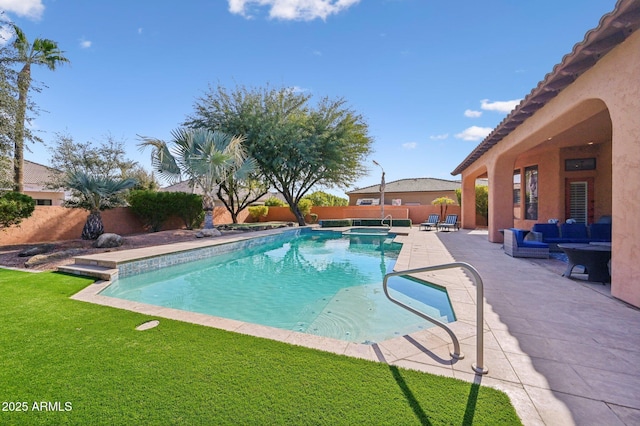 view of pool with an in ground hot tub, an outdoor hangout area, and a patio area