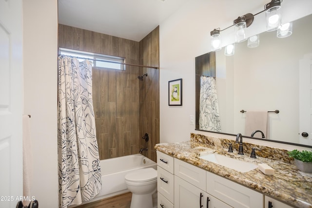full bathroom featuring toilet, vanity, wood finished floors, and shower / tub combo with curtain