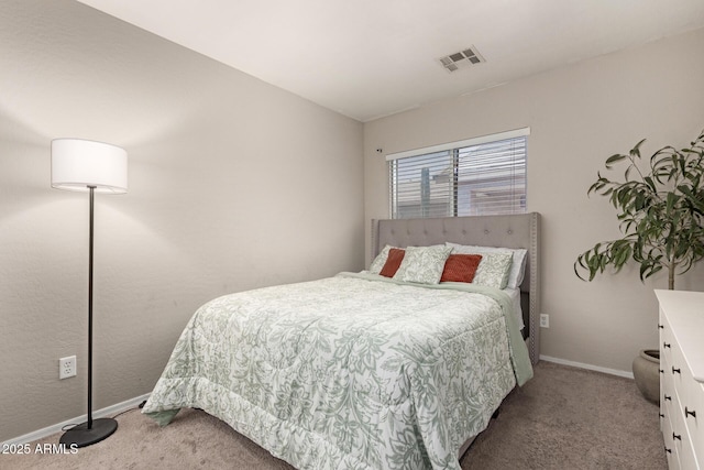 bedroom featuring carpet flooring, baseboards, and visible vents