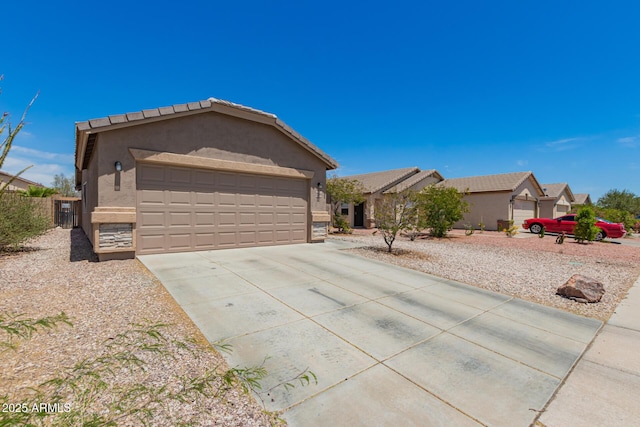 ranch-style house featuring stucco siding and driveway