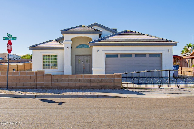 view of front of house with a garage