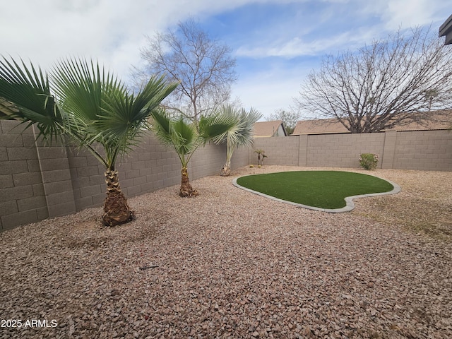 view of yard featuring a fenced backyard