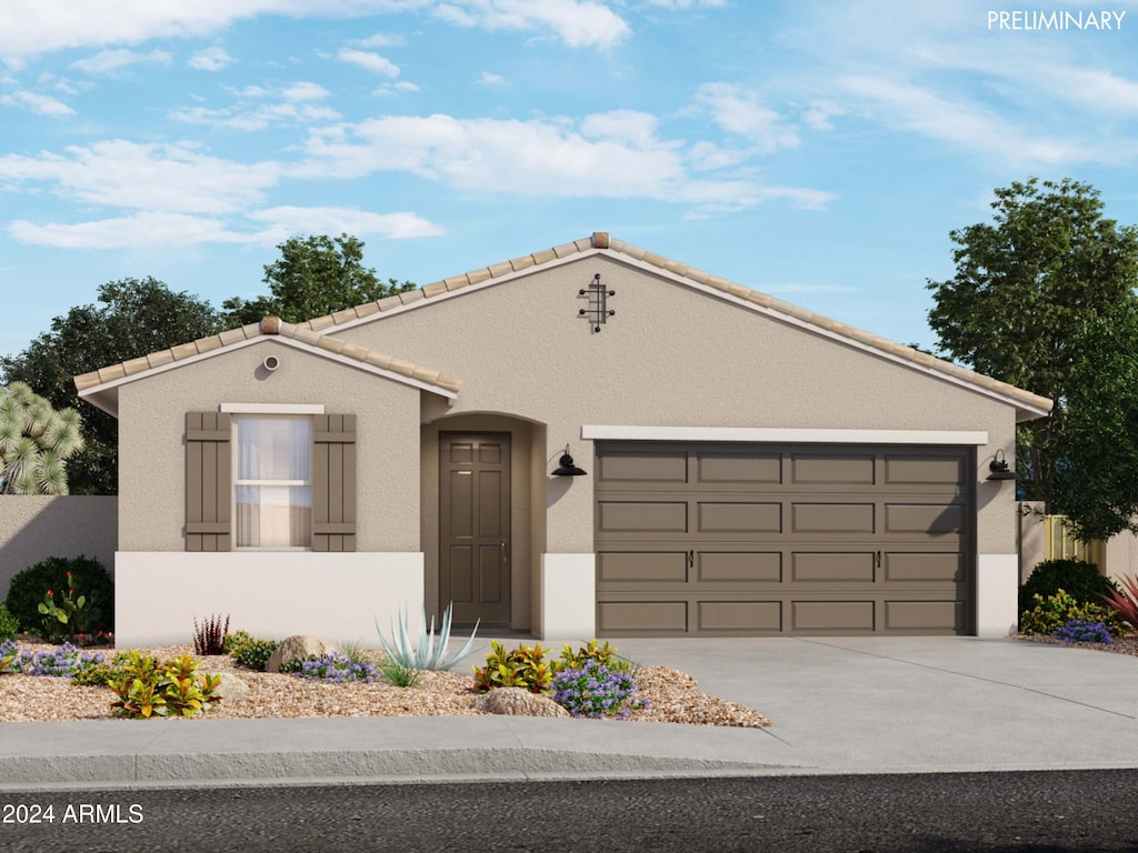 ranch-style house featuring a garage