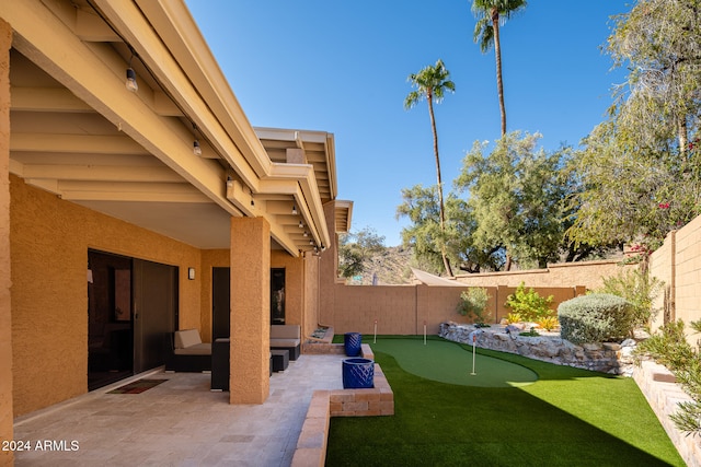 view of yard with an outdoor hangout area and a patio area