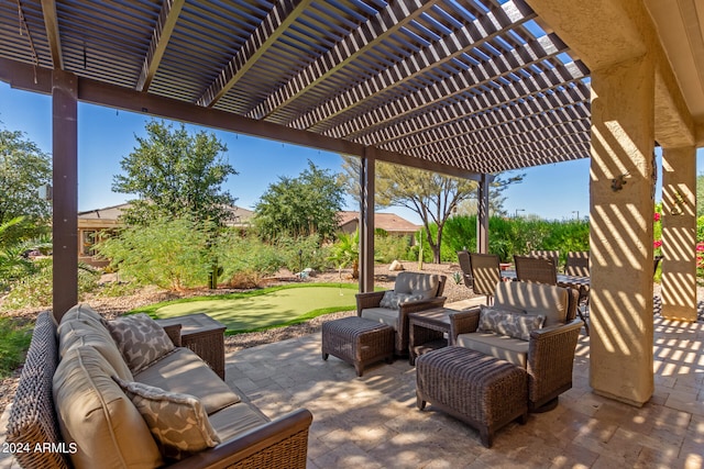 view of patio / terrace with an outdoor living space and a pergola