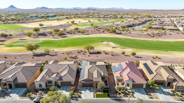 aerial view featuring a residential view, a mountain view, and golf course view