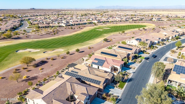 bird's eye view with view of golf course and a residential view