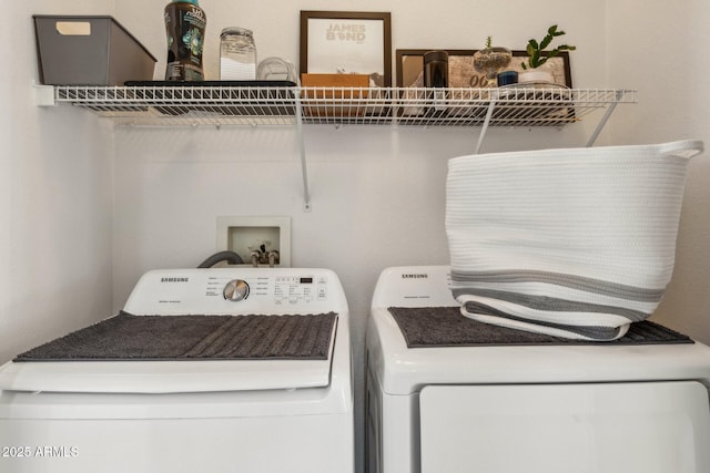 laundry room featuring washer and clothes dryer