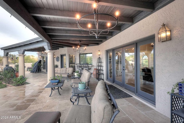 view of patio with outdoor lounge area and french doors