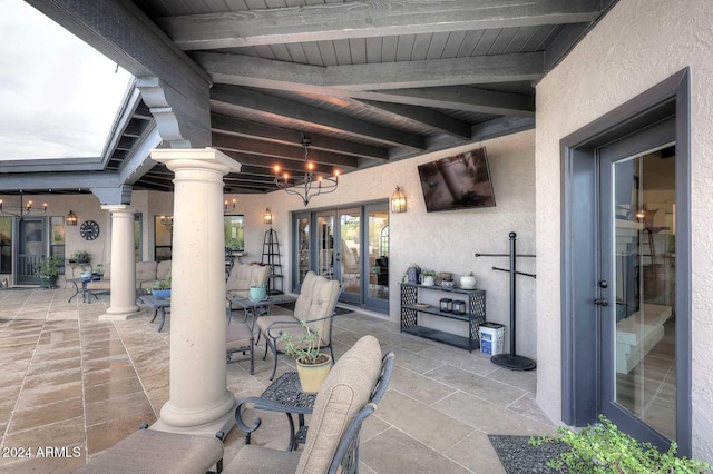 view of patio / terrace featuring french doors