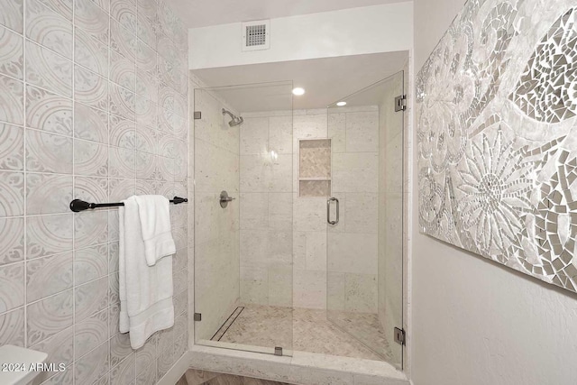 bathroom with walk in shower