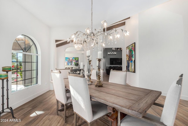 dining room featuring a chandelier and hardwood / wood-style flooring