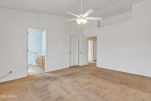 empty room with light carpet and ceiling fan