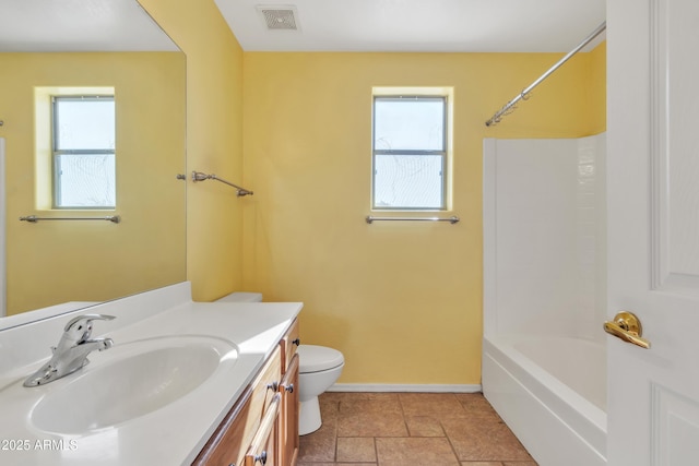 full bathroom featuring vanity, shower / bathing tub combination, and toilet