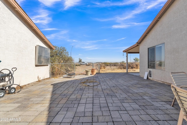 view of patio featuring an outdoor fire pit