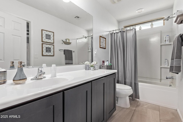 bathroom with tile patterned floors, toilet, shower / tub combo with curtain, a sink, and double vanity