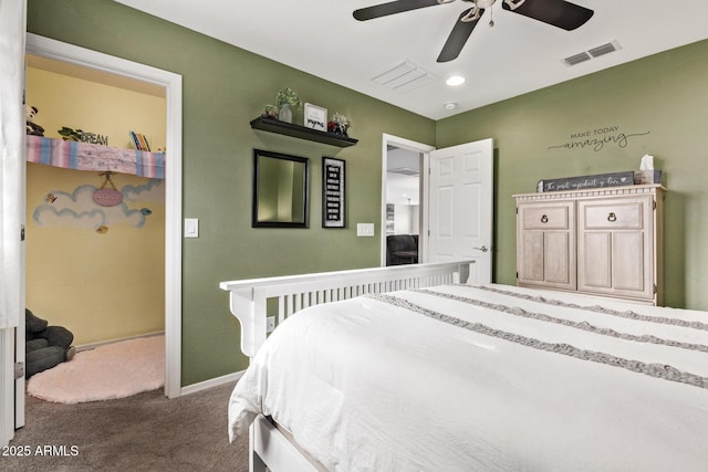 bedroom with visible vents, baseboards, carpet, and a ceiling fan