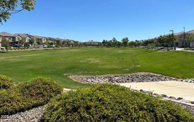 1081 E Armstrong Way, Chandler, AZ 85286 - view of community featuring a residential view and a lawn