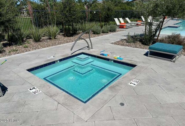 1081 E Armstrong Way, Chandler, AZ 85286 - community pool featuring a patio area