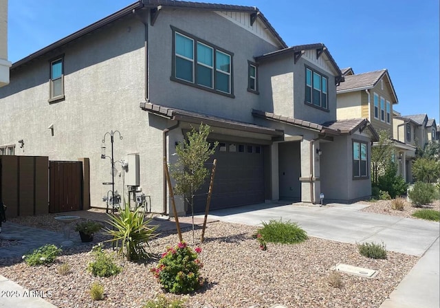 1081 E Armstrong Way, Chandler, AZ 85286 - view of front of property featuring stucco siding, an attached garage, and driveway