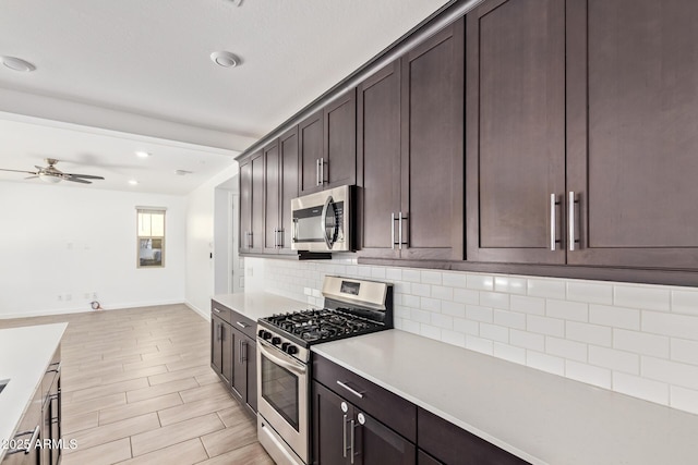 1081 E Armstrong Way, Chandler, AZ 85286 - kitchen featuring stainless steel appliances, decorative backsplash, dark brown cabinetry, ceiling fan, and recessed lighting