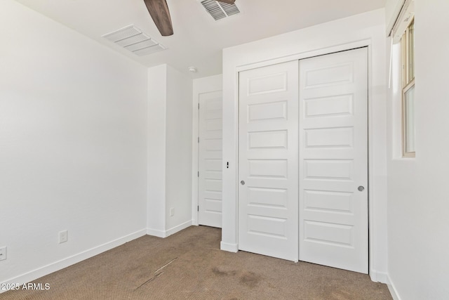 1081 E Armstrong Way, Chandler, AZ 85286 - unfurnished bedroom featuring carpet, a closet, baseboards, and a ceiling fan