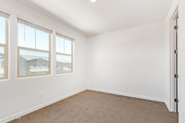 1081 E Armstrong Way, Chandler, AZ 85286 - carpeted empty room with baseboards