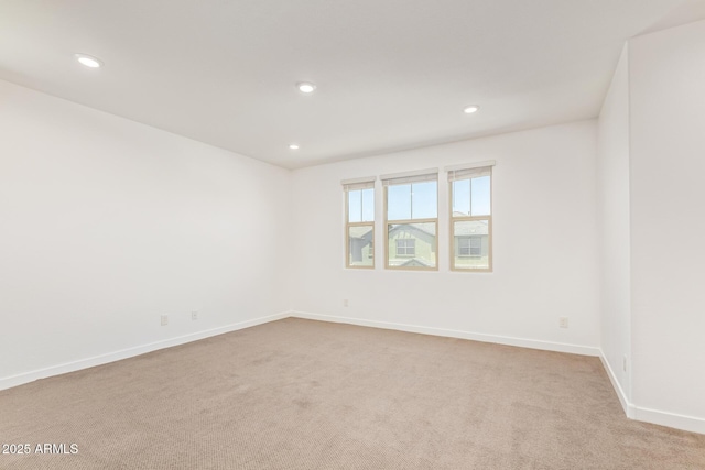 1081 E Armstrong Way, Chandler, AZ 85286 - spare room featuring carpet floors, baseboards, and recessed lighting