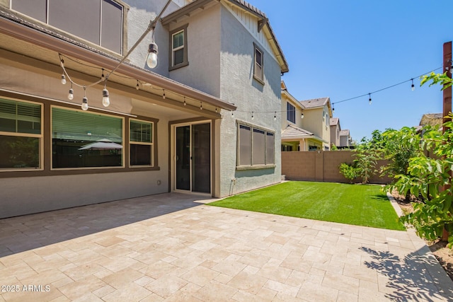 1081 E Armstrong Way, Chandler, AZ 85286 - back of house with stucco siding and a patio area