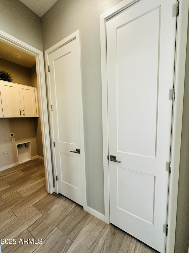 hall featuring light wood-type flooring