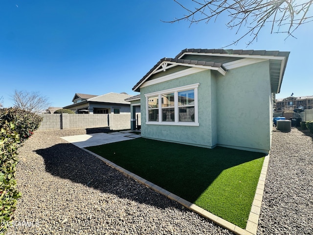 back of property featuring a patio area