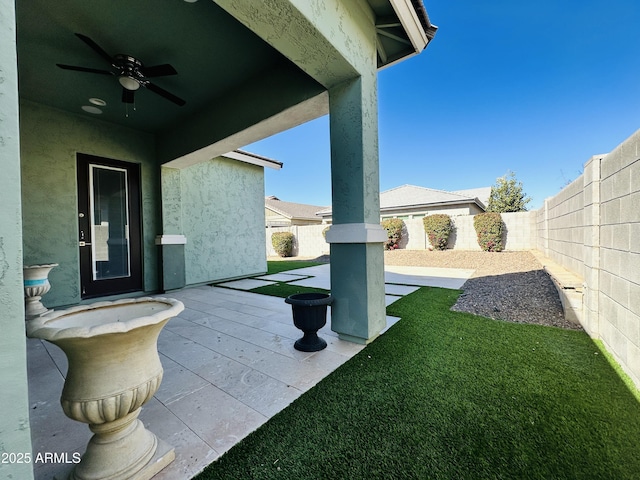 view of patio / terrace with ceiling fan