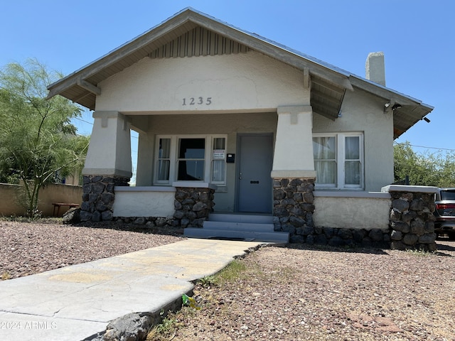 bungalow featuring a porch